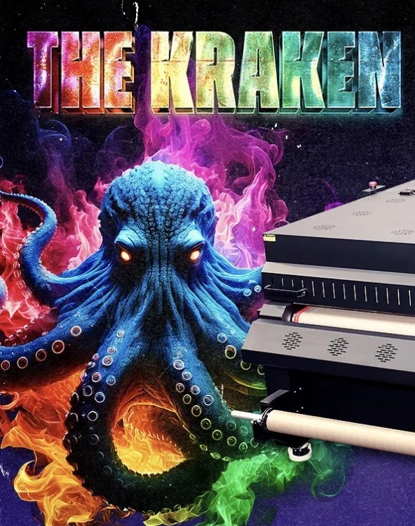 The Kraken surrounded by neon smoke behind InkDrop's DTF printer and dryer